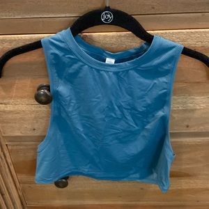 Teal color Lululemon tank.